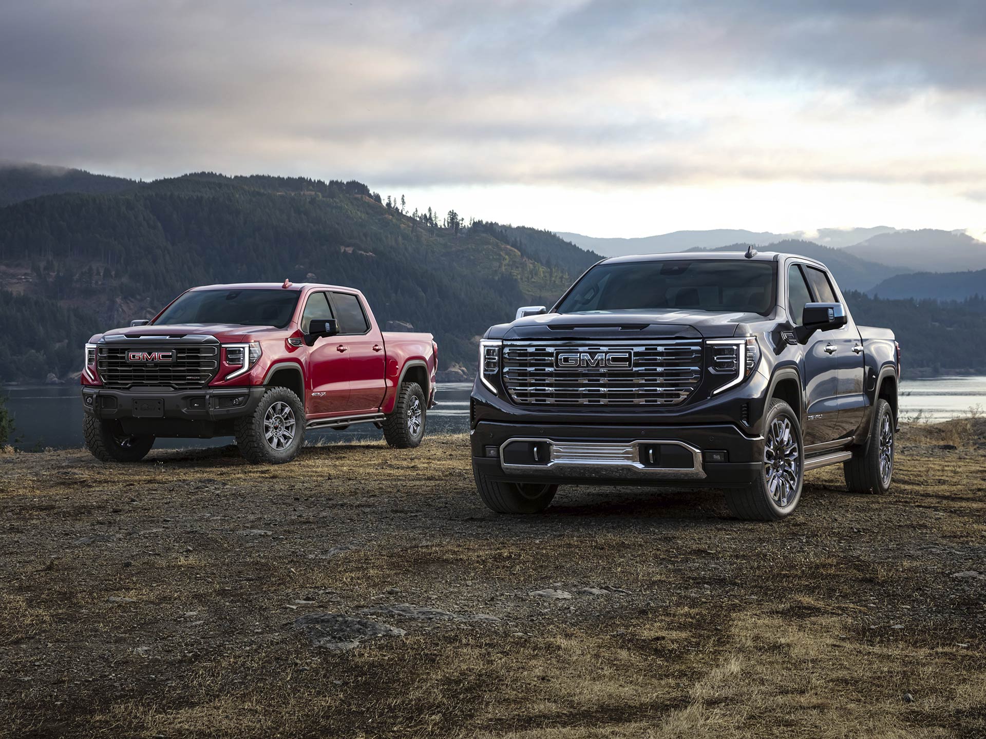 two trucks in the mountains