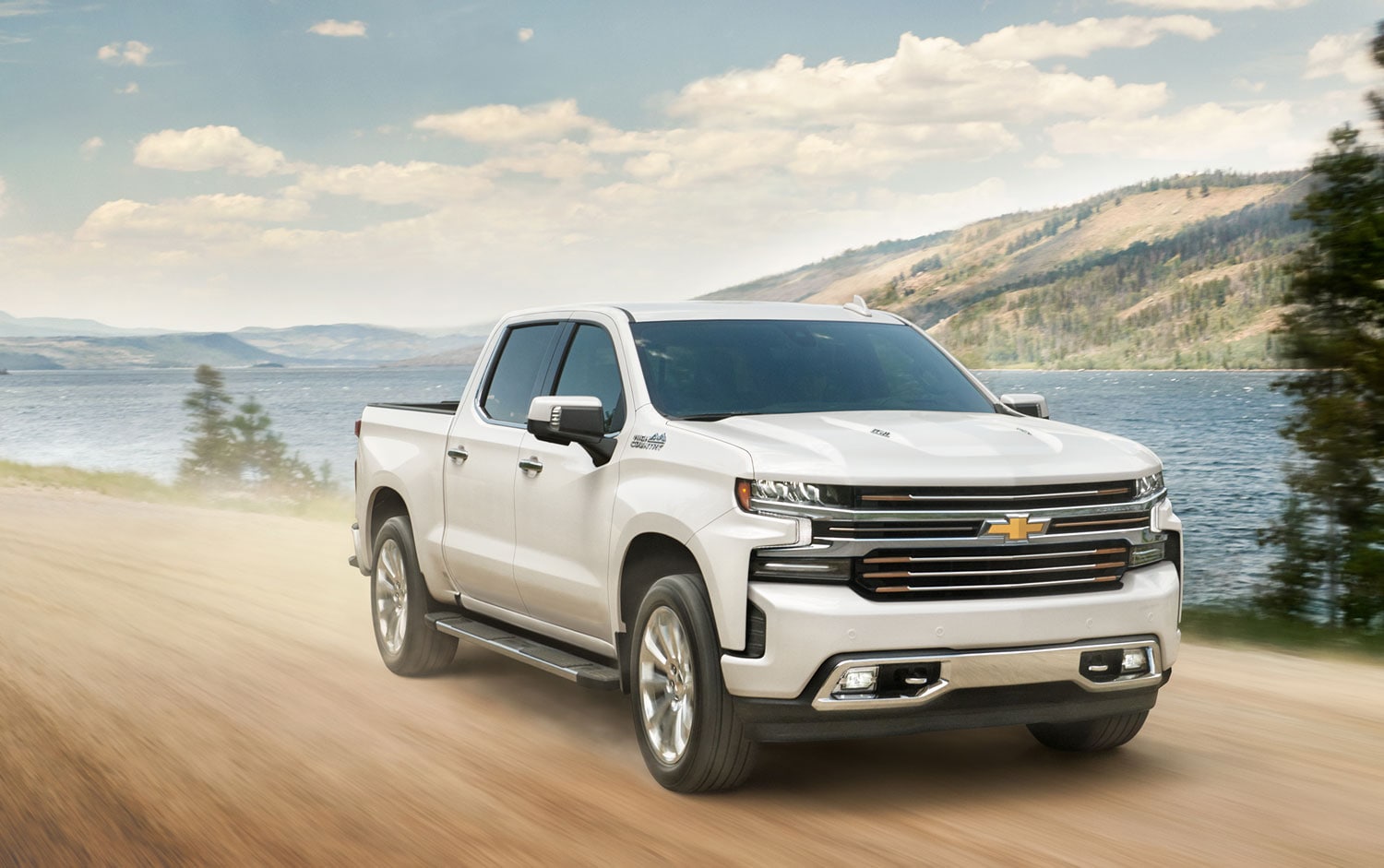 Chevy Silverado 1500 driving on dirt road