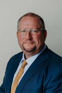 Staff member Delbert Bunker from ID_d213c5b4e0af