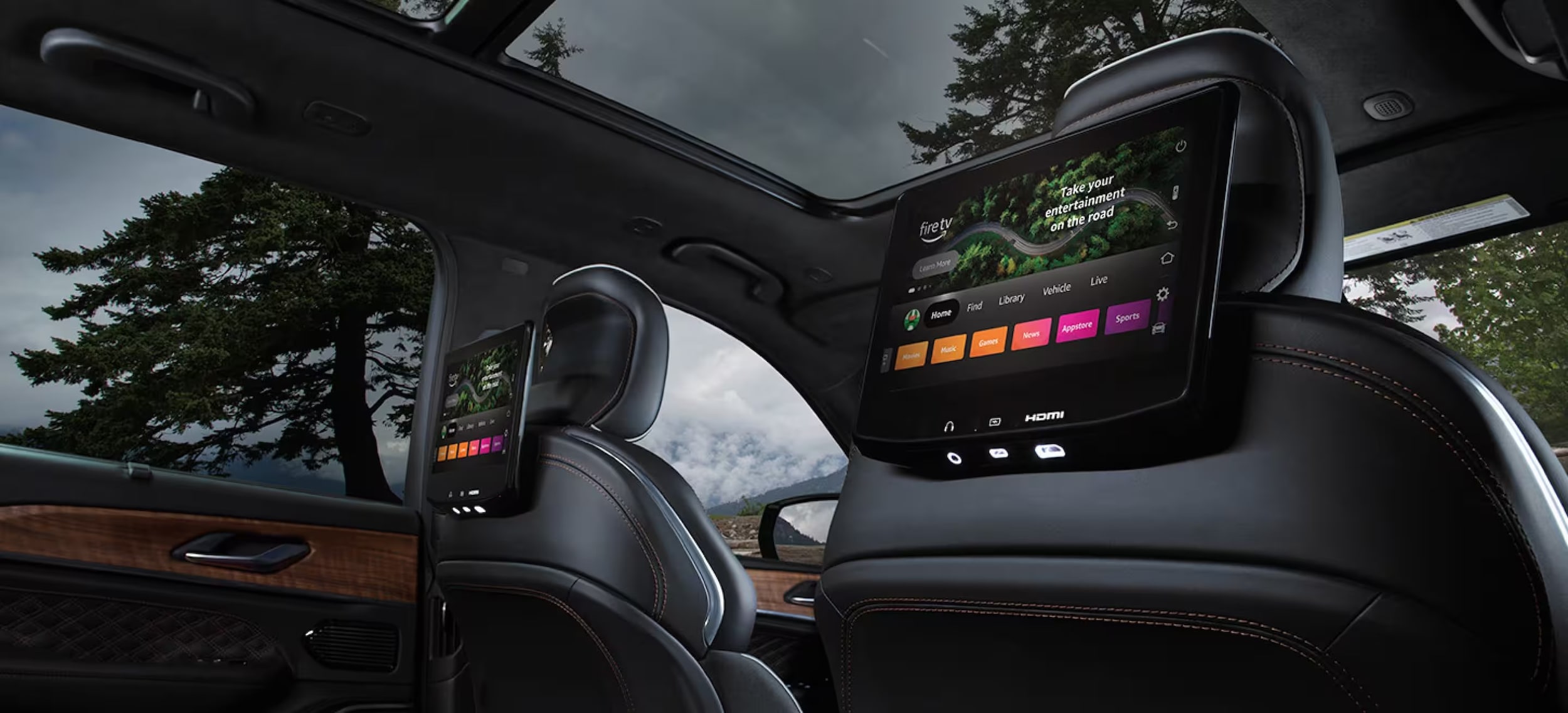 Rear-seat entertainment screens in the 2026 Jeep Grand Cherokee near Baytown