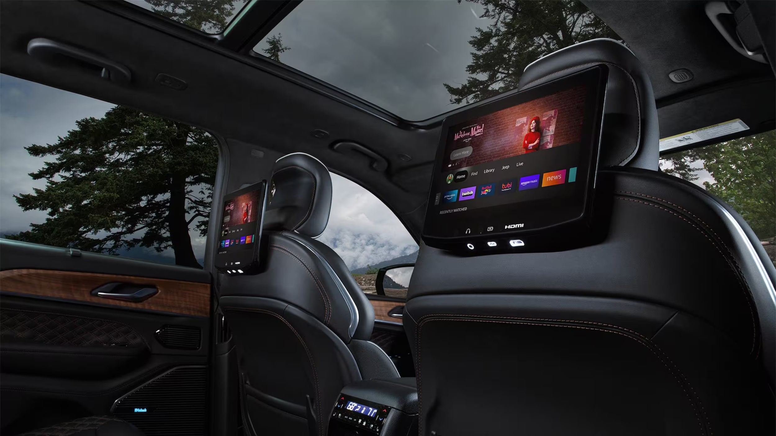 Rear-seat%20entertainment%20screens%20inside%20the%202027%20Jeep%C2%AE%20Grand%20Cherokee%20near%20Baytown%2C%20TX.jpeg Rear-seat entertainment screens inside the 2027 Jeep® Grand Cherokee near Baytown, TX