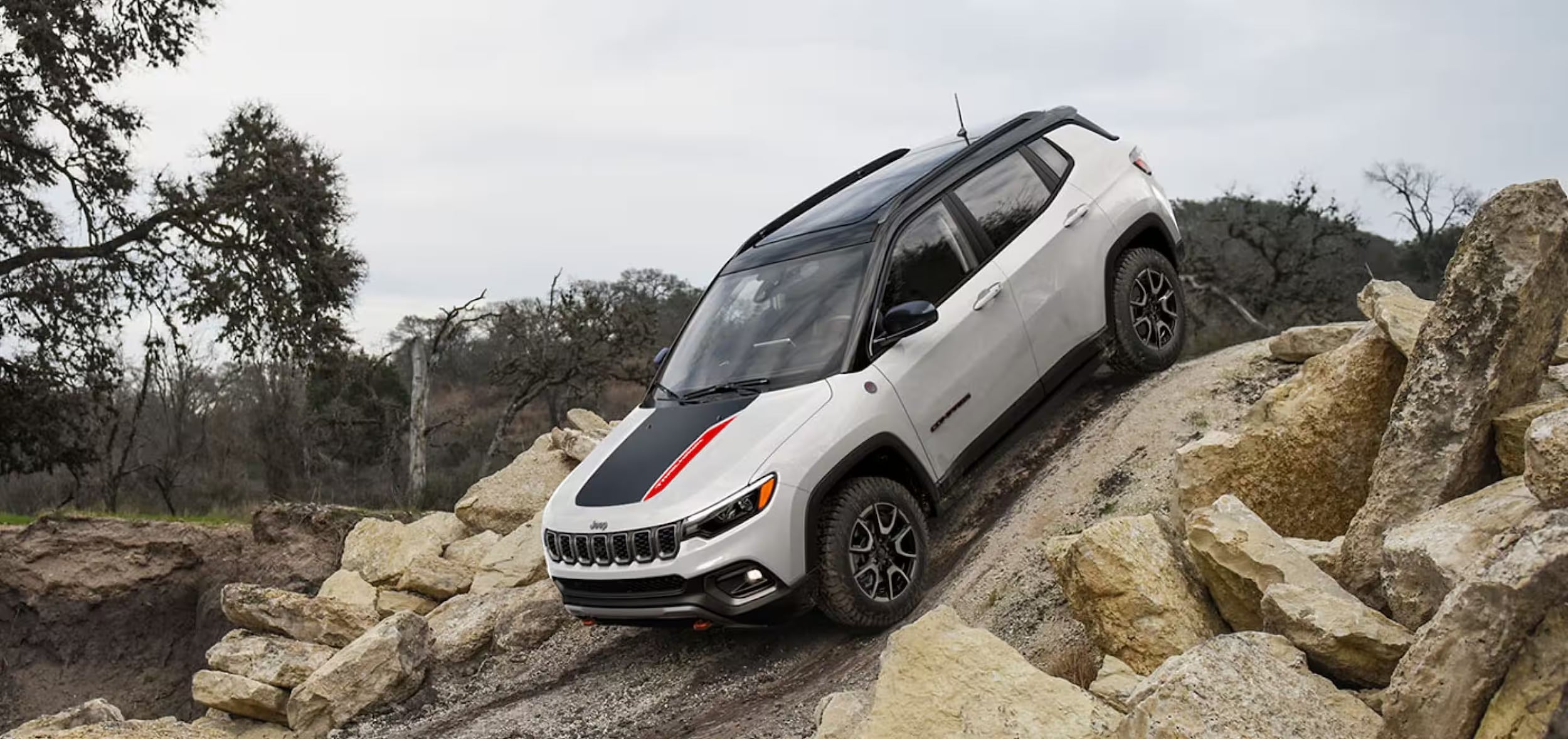 2025 Jeep Compass driving near Beaumont
