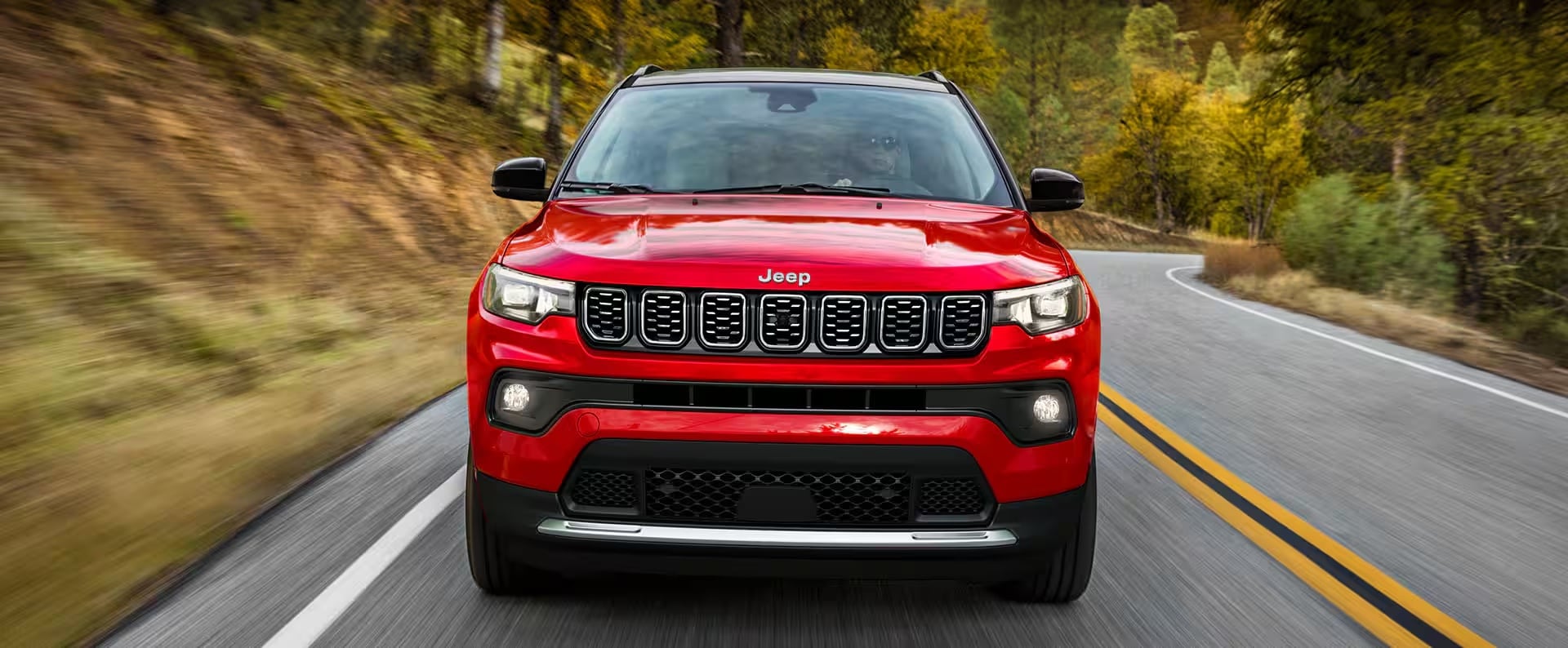2025 Jeep Compass driving near Lake Charles