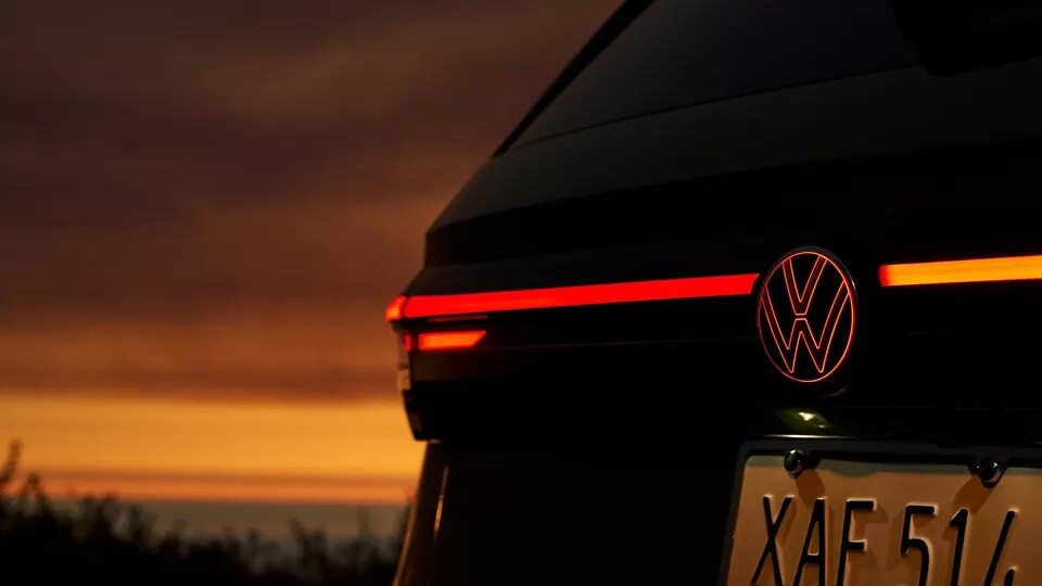 Illuminated rear VW badge on the 2026 Volkswagen Taos near Lafayette