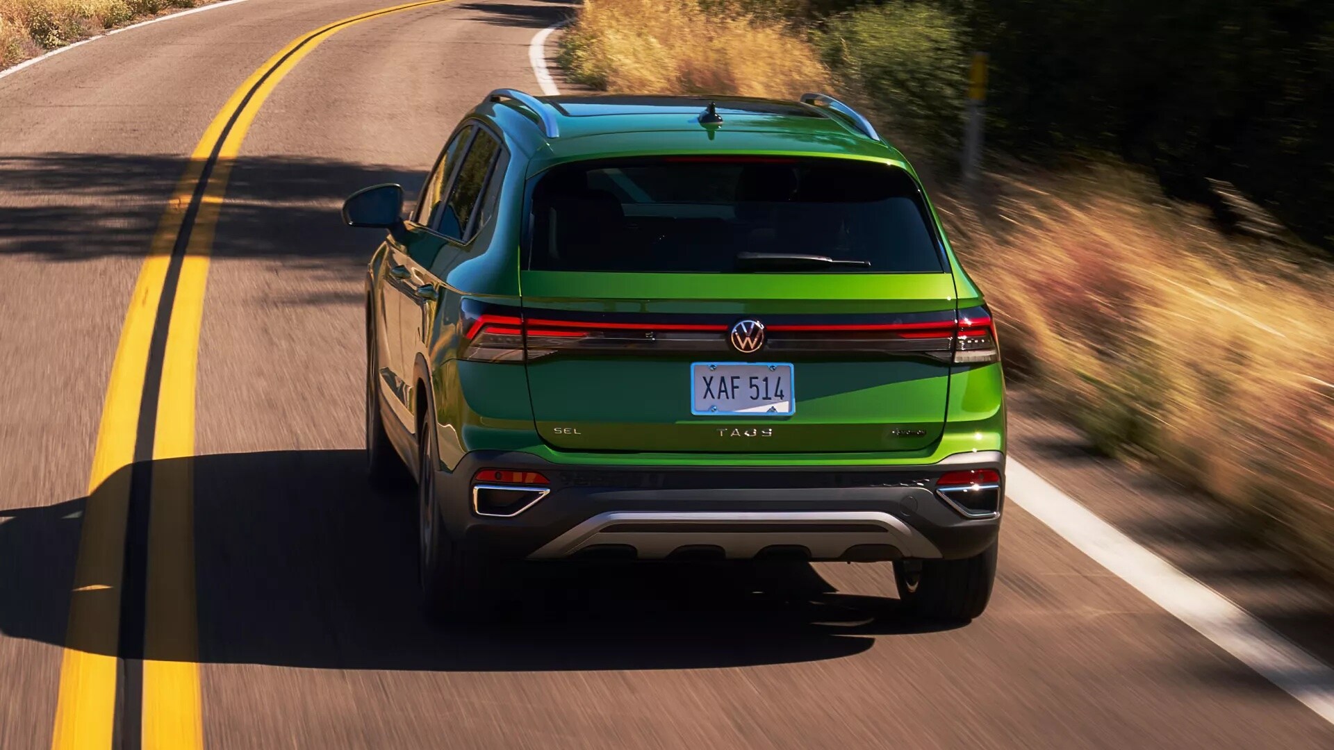 2026 Volkswagen Taos driving near Lafayette