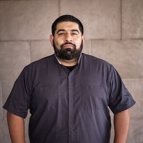 Staff member Oscar Trujillo from 2895bc90b402