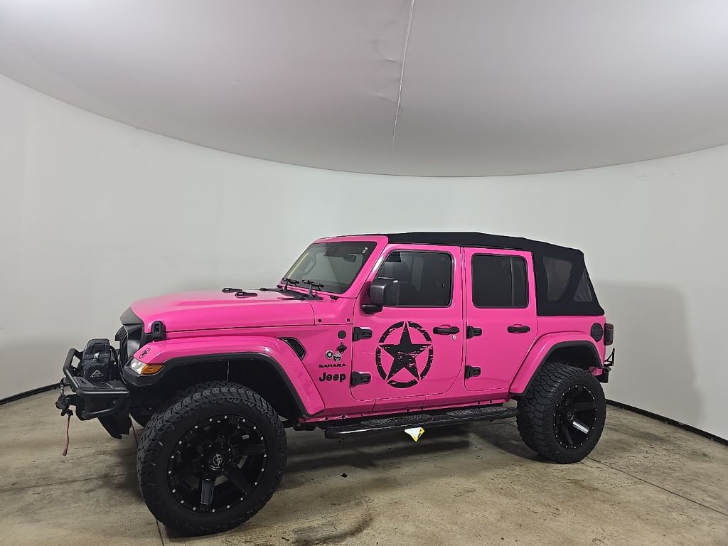 Used 2019 Jeep Wrangler Unlimited Sahara with VIN 1C4HJXEG3KW568628 for sale in Miami, FL