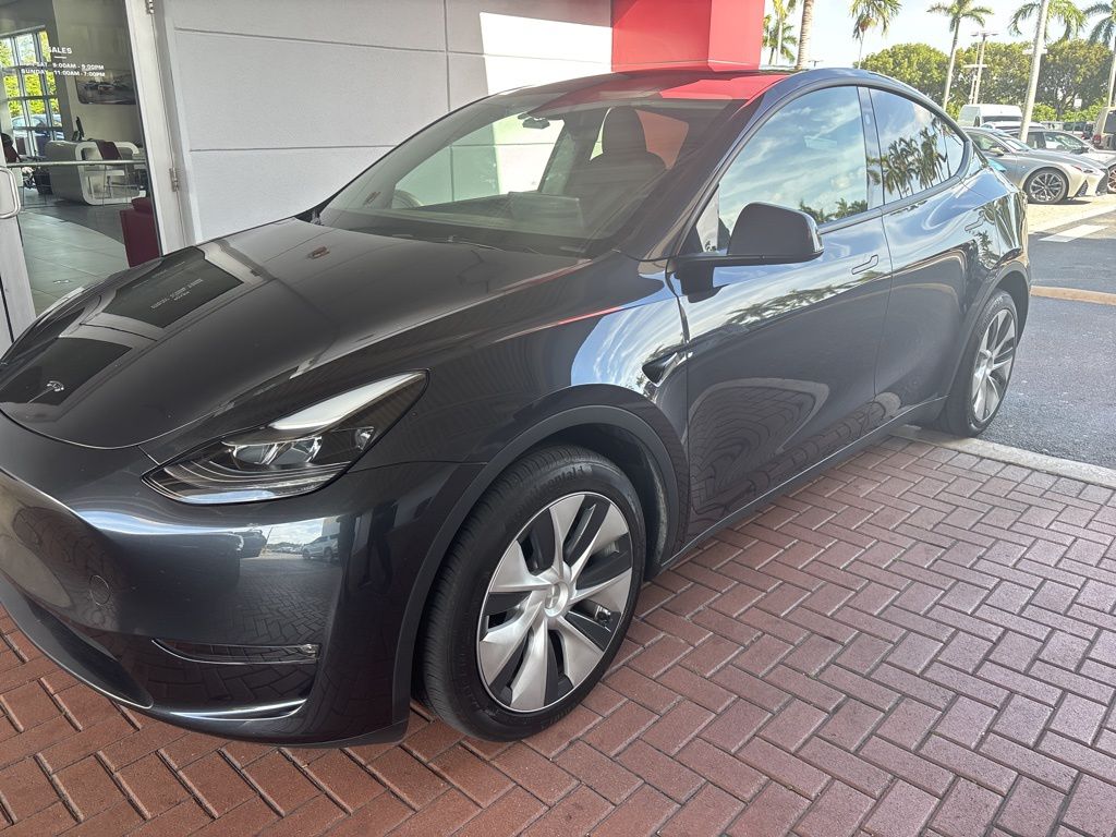 Used 2024 Tesla Model Y Long Range with VIN 7SAYGDEE6RF037842 for sale in Northfield, Minnesota