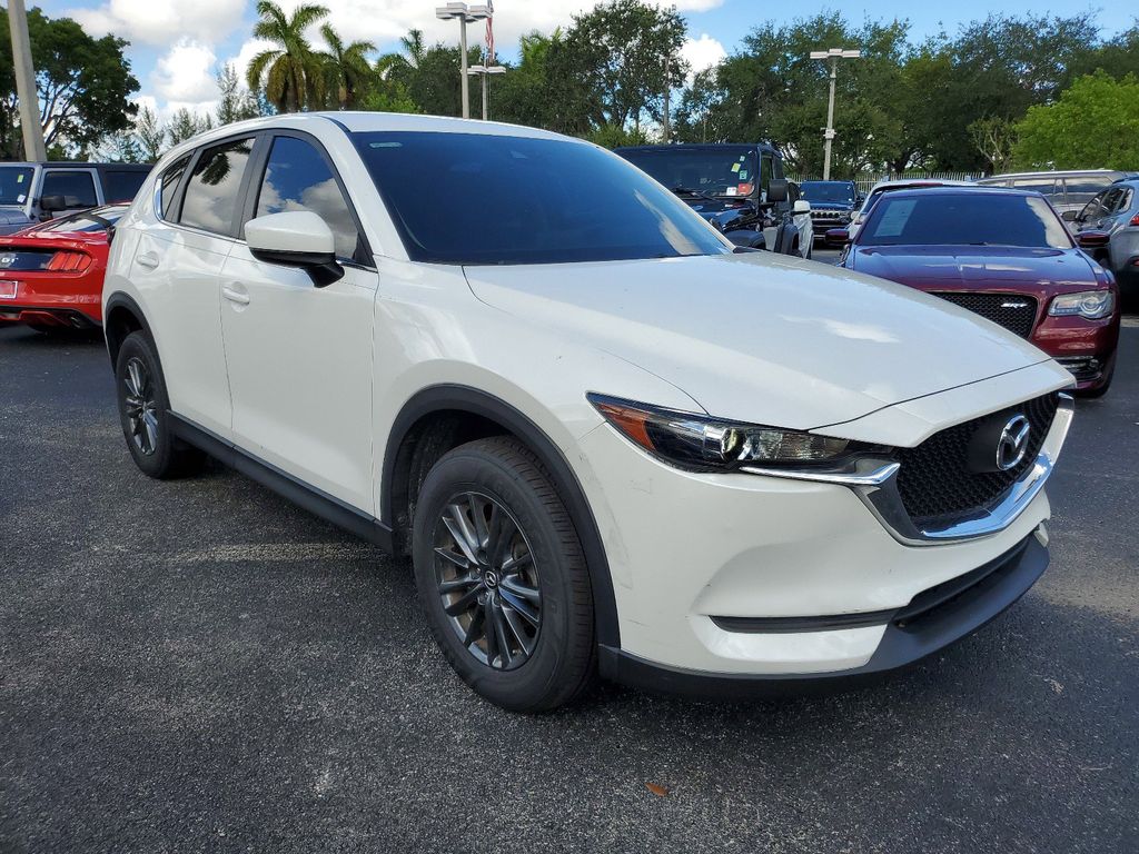 Used 2019 Mazda CX-5 Sport with VIN JM3KFABM4K1581956 for sale in Miami, FL