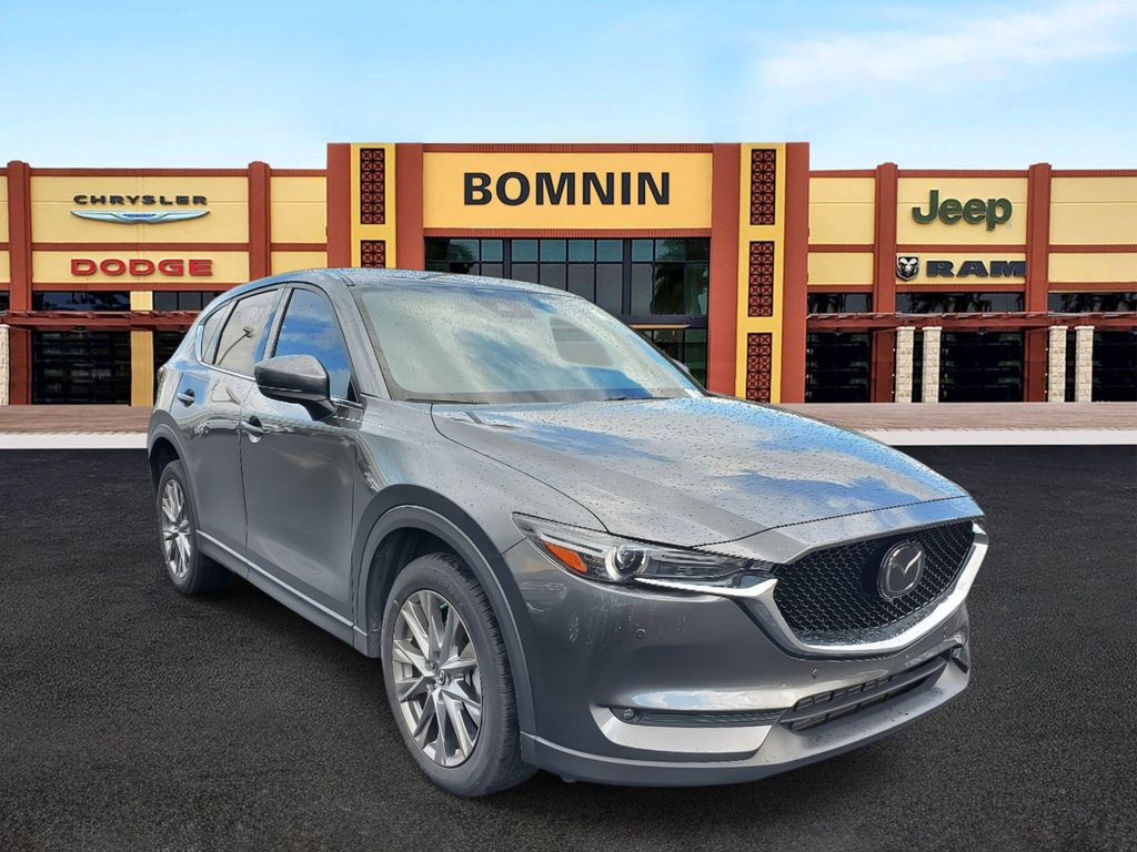 Used 2021 Mazda CX-5 Signature with VIN JM3KFBEY4M0418673 for sale in Miami, FL