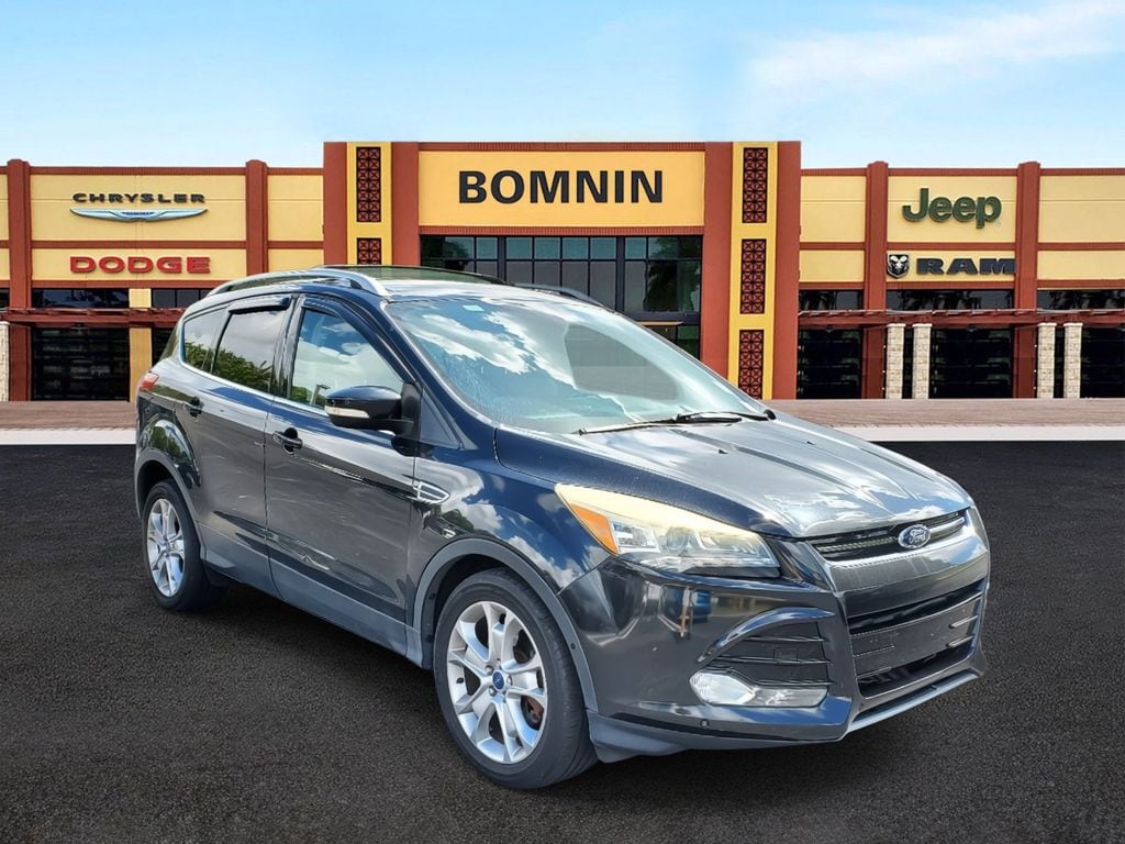 Used 2015 Ford Escape Titanium with VIN 1FMCU0J95FUC40236 for sale in Miami, FL