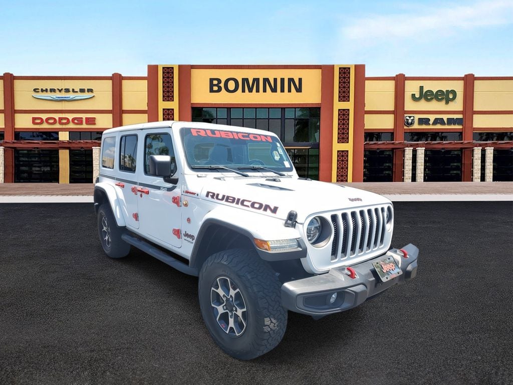 Used 2022 Jeep Wrangler Unlimited Rubicon with VIN 1C4HJXFG1NW212147 for sale in Miami, FL