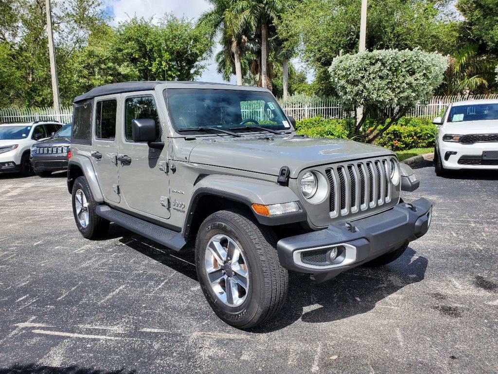 Used 2022 Jeep Wrangler Unlimited Sahara with VIN 1C4HJXEG0NW241804 for sale in Miami, FL