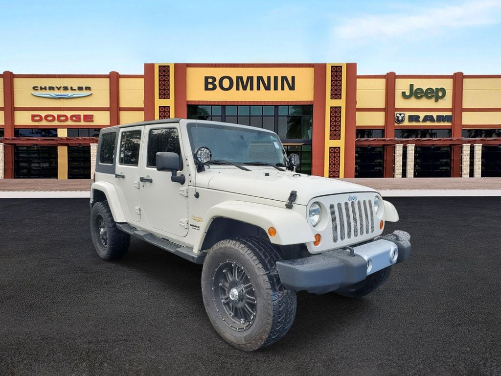 Used 2010 Jeep Wrangler Unlimited Sahara with VIN 1J4BA5H13AL224244 for sale in Miami, FL