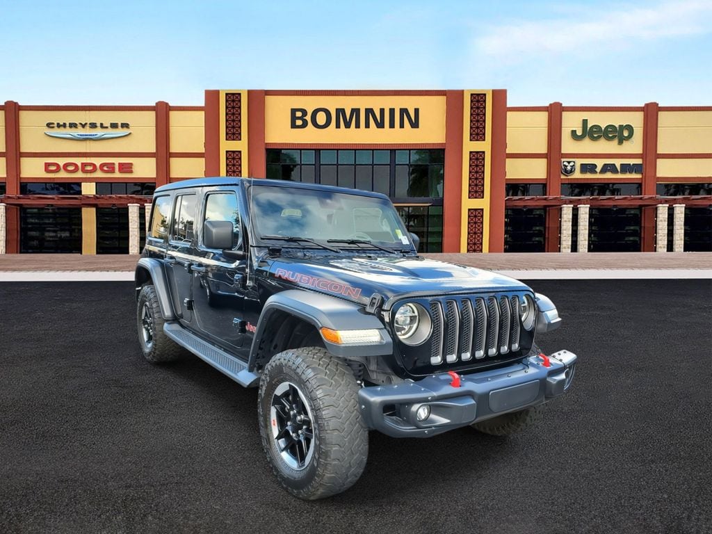 Used 2020 Jeep Wrangler Unlimited Rubicon with VIN 1C4JJXFM9LW327423 for sale in Miami, FL