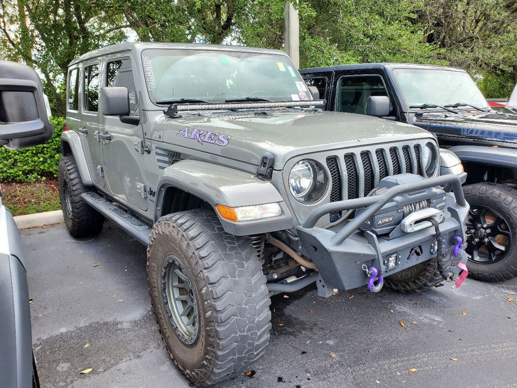 Used 2021 Jeep Wrangler Unlimited Sahara Altitude with VIN 1C4HJXEN5MW740658 for sale in Miami, FL