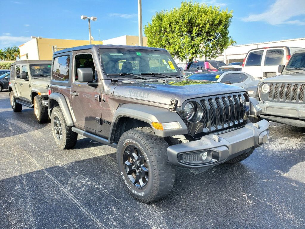 Used 2022 Jeep Wrangler Willys with VIN 1C4HJXAG7NW183387 for sale in Miami, FL