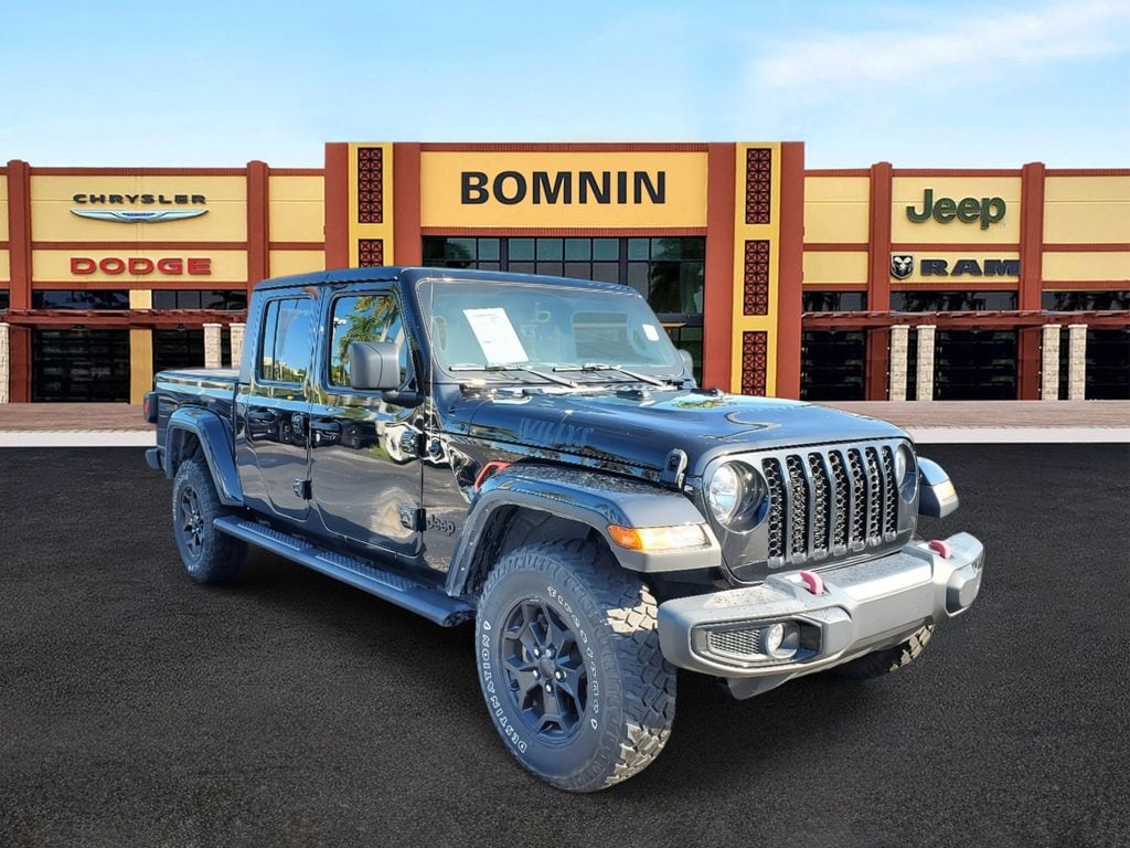 Used 2022 Jeep Gladiator WILLYS with VIN 1C6HJTAG3NL119557 for sale in Miami, FL