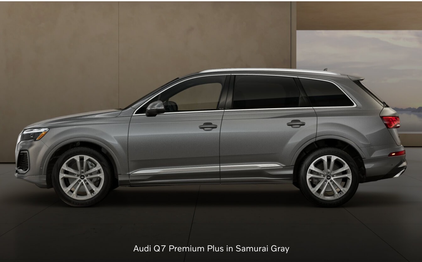 2026 Audi Q7 Premium Plus side profile view parked inside a modern studio.