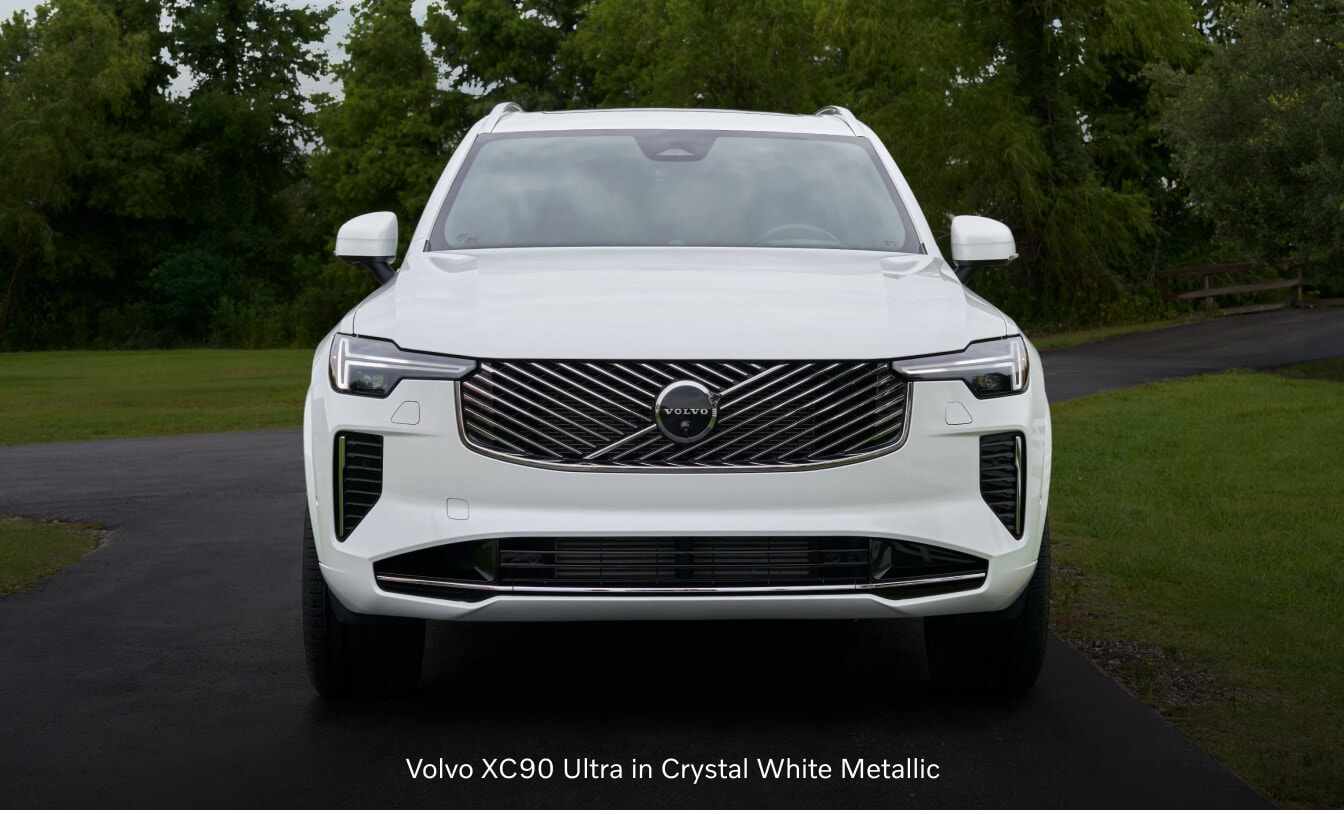 2026 Volvo XC90 Ultra head-on front view parked on an asphalt pathway.