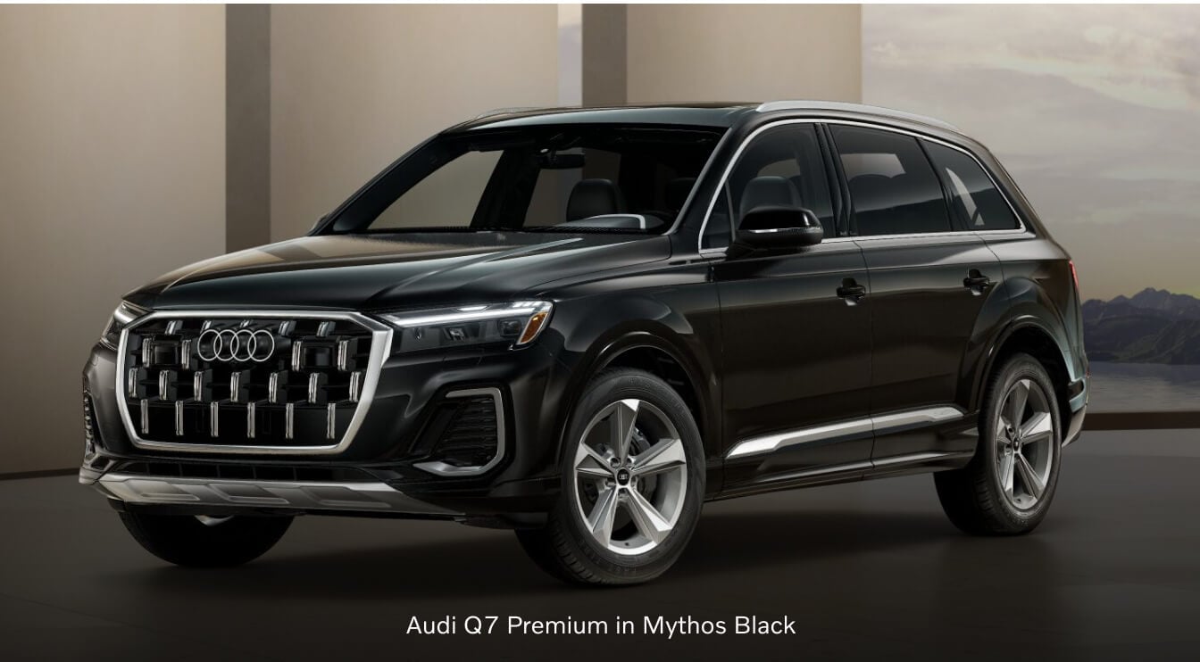 2026 Audi Q7 Premium parked at a three-quarter angle inside a modern studio.