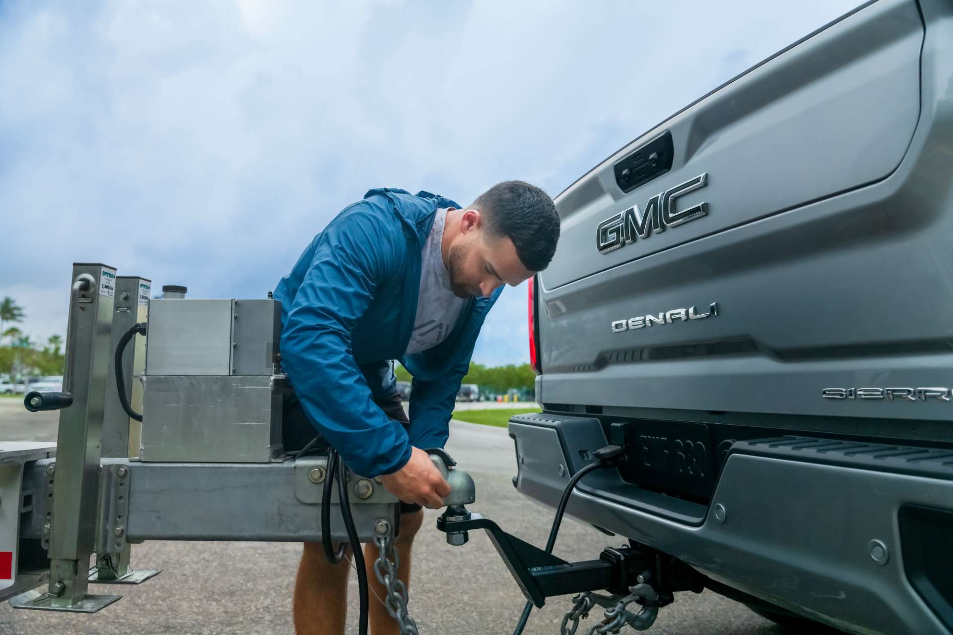 Customer hooking up GMC truck to a trailer