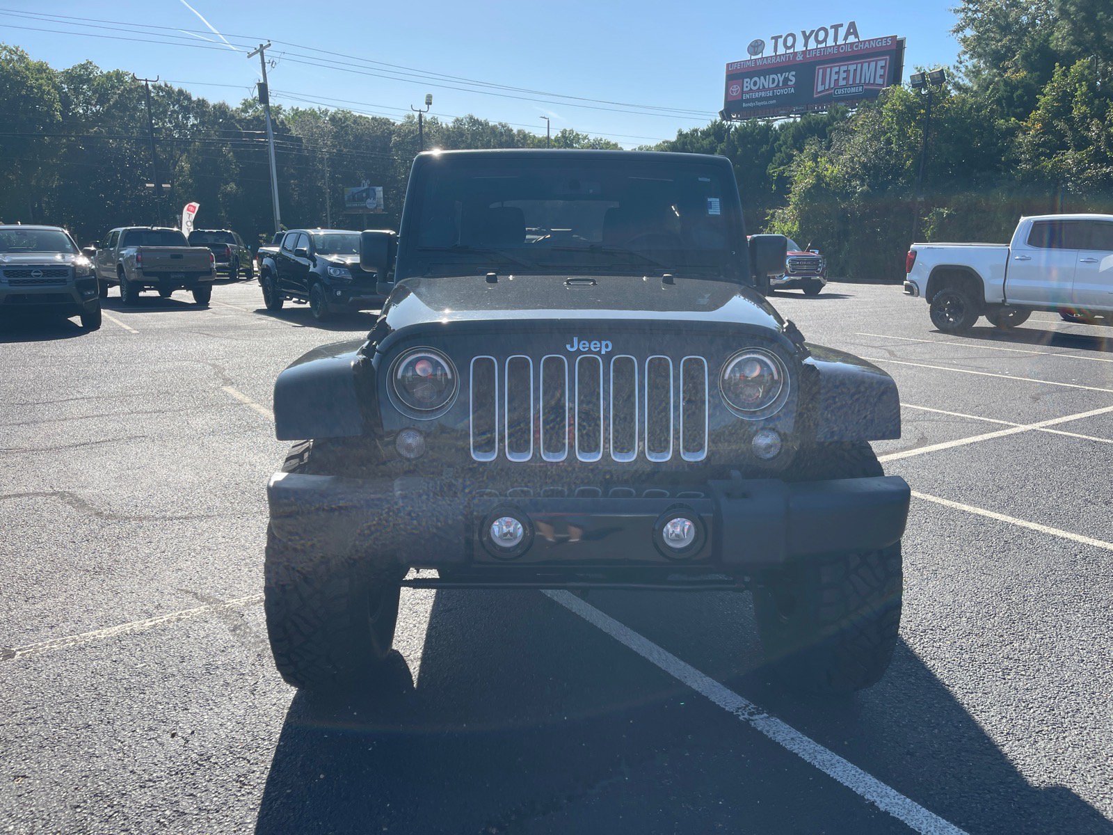 Used 2016 Jeep Wrangler Unlimited Sahara with VIN 1C4BJWEG2GL280026 for sale in Enterprise, AL