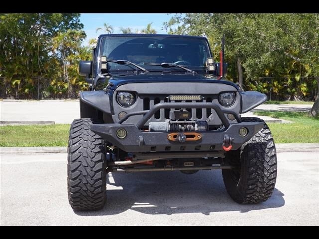 Used 2015 Jeep Wrangler Unlimited Sport with VIN 1C4BJWDG3FL549568 for sale in Bonita Springs, FL