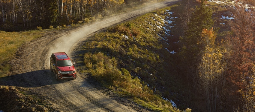Aerial photo of the New 2018 Ford Expedition traveling on a dirt road in West Michigan