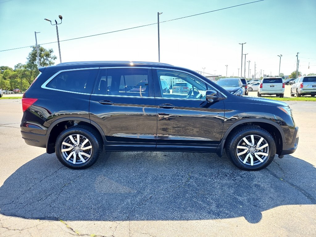 View vehicle photo 5