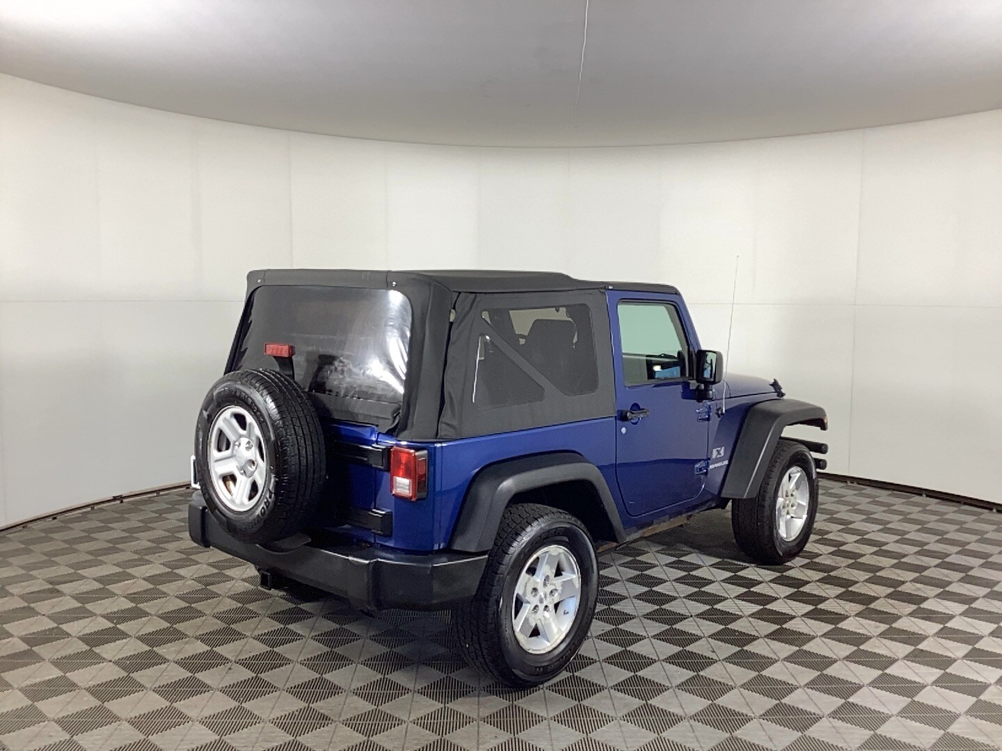 Used 2009 Jeep Wrangler X with VIN 1J4FA24149L745880 for sale in Grand Rapids, MI