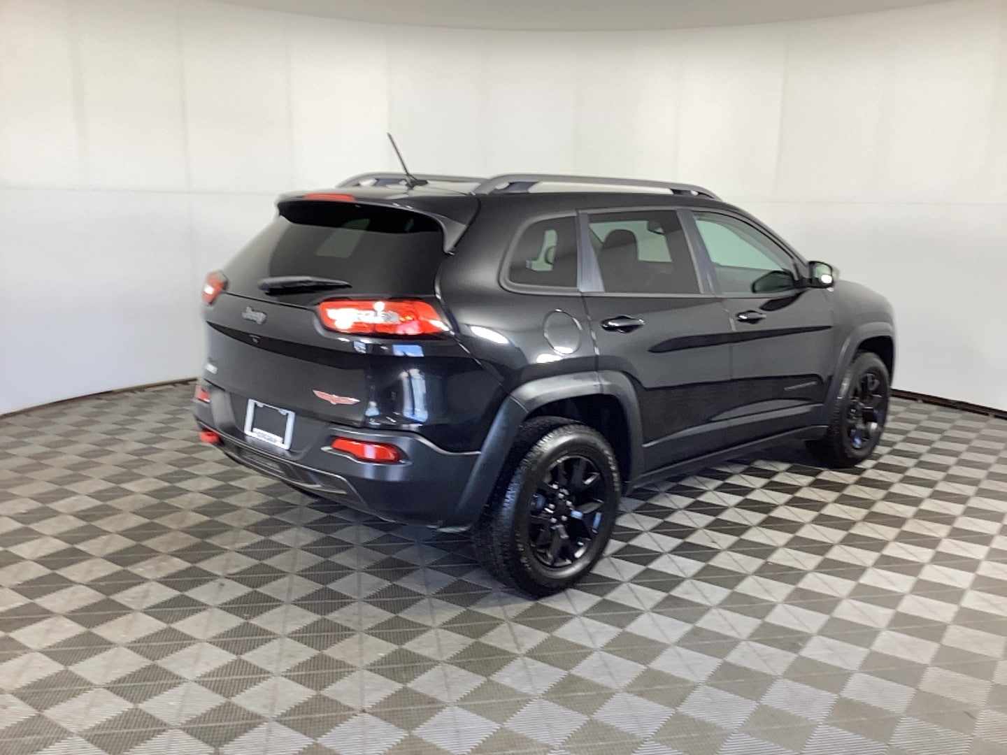 Used 2015 Jeep Cherokee Trailhawk with VIN 1C4PJMBB0FW682532 for sale in Grand Rapids, MI