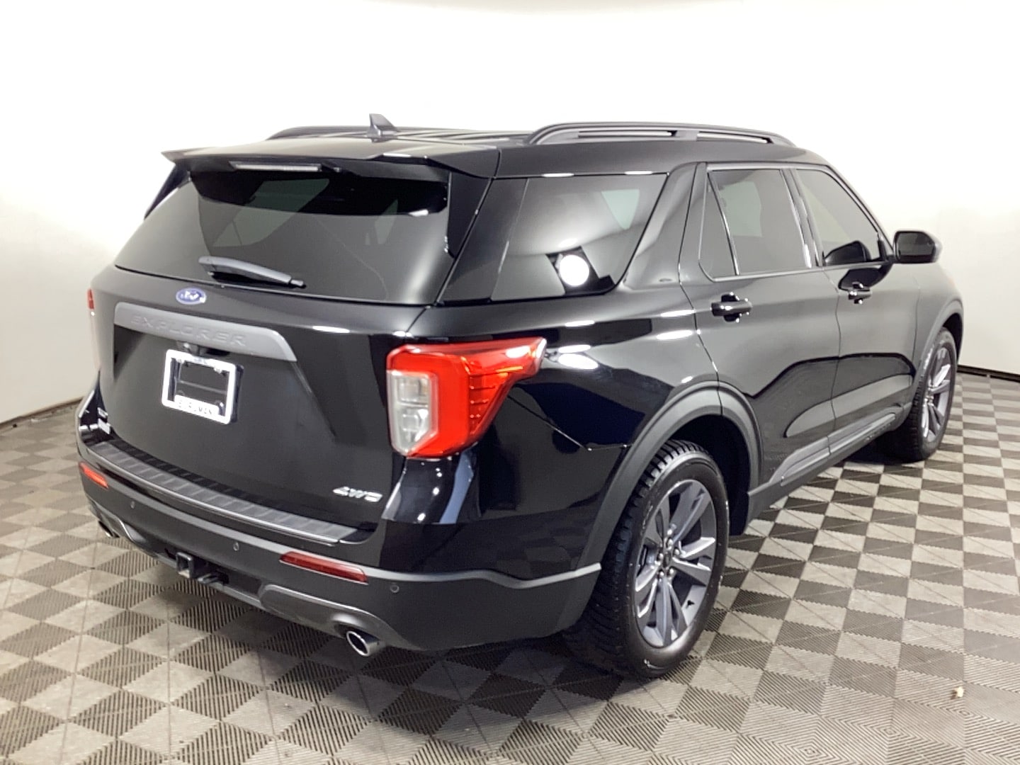 Used 2021 Ford Explorer XLT with VIN 1FMSK8DH1MGB94953 for sale in Grand Rapids, MI