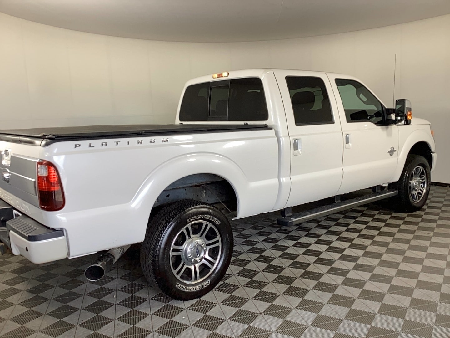 Used 2014 Ford F-250 Super Duty Lariat with VIN 1FT7W2BT8EEA65303 for sale in Grand Rapids, MI