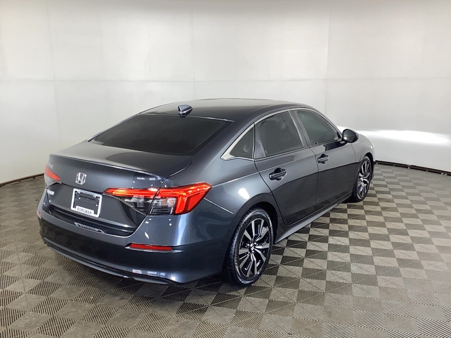 Used 2022 Honda Civic EX with VIN 2HGFE1F79NH322923 for sale in Grand Rapids, MI