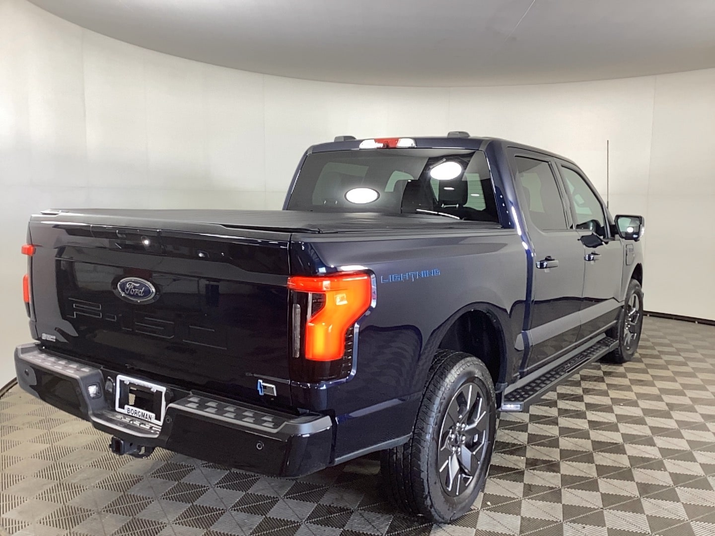Used 2023 Ford F-150 Lightning XLT with VIN 1FTVW1EL2PWG55362 for sale in Grand Rapids, MI