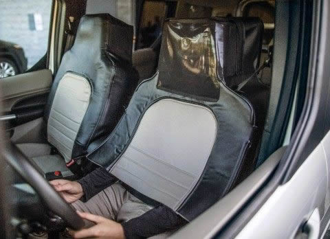 DriverDisguised_AutonomousVehicleResearch_480x348.jpg A driver disguises himself as a car seat to test people's reaction to a Ford Autonomous Vehicle
