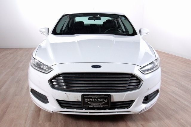 Used 2014 Ford Fusion SE Hybrid with VIN 3FA6P0LU5ER187429 for sale in Golden Valley, Minnesota