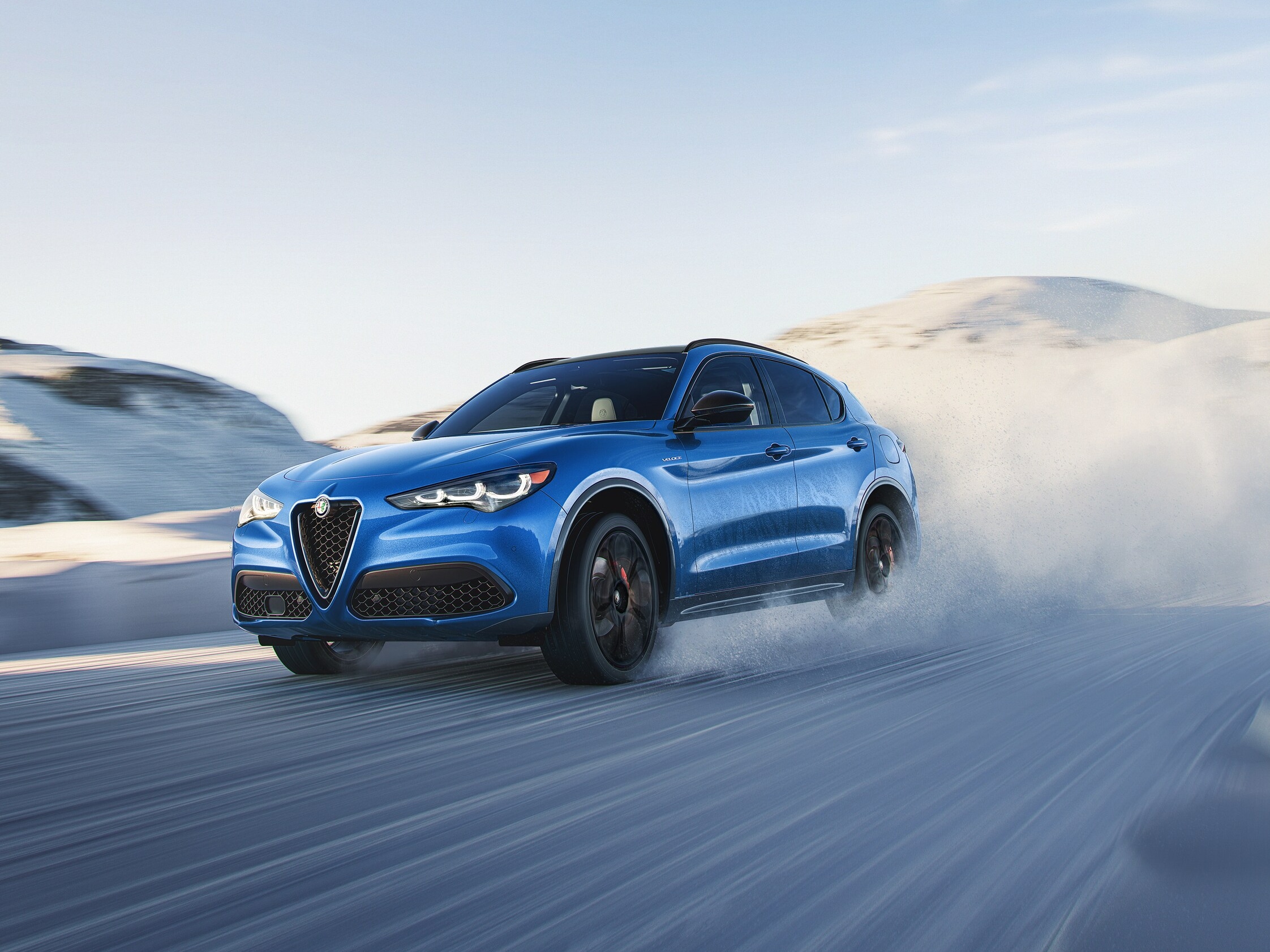  Person cheerfully signing documents.