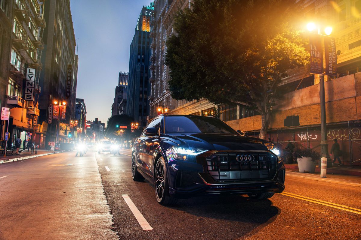 2023 Audi Q8 Driving on a Dimly Lit Street