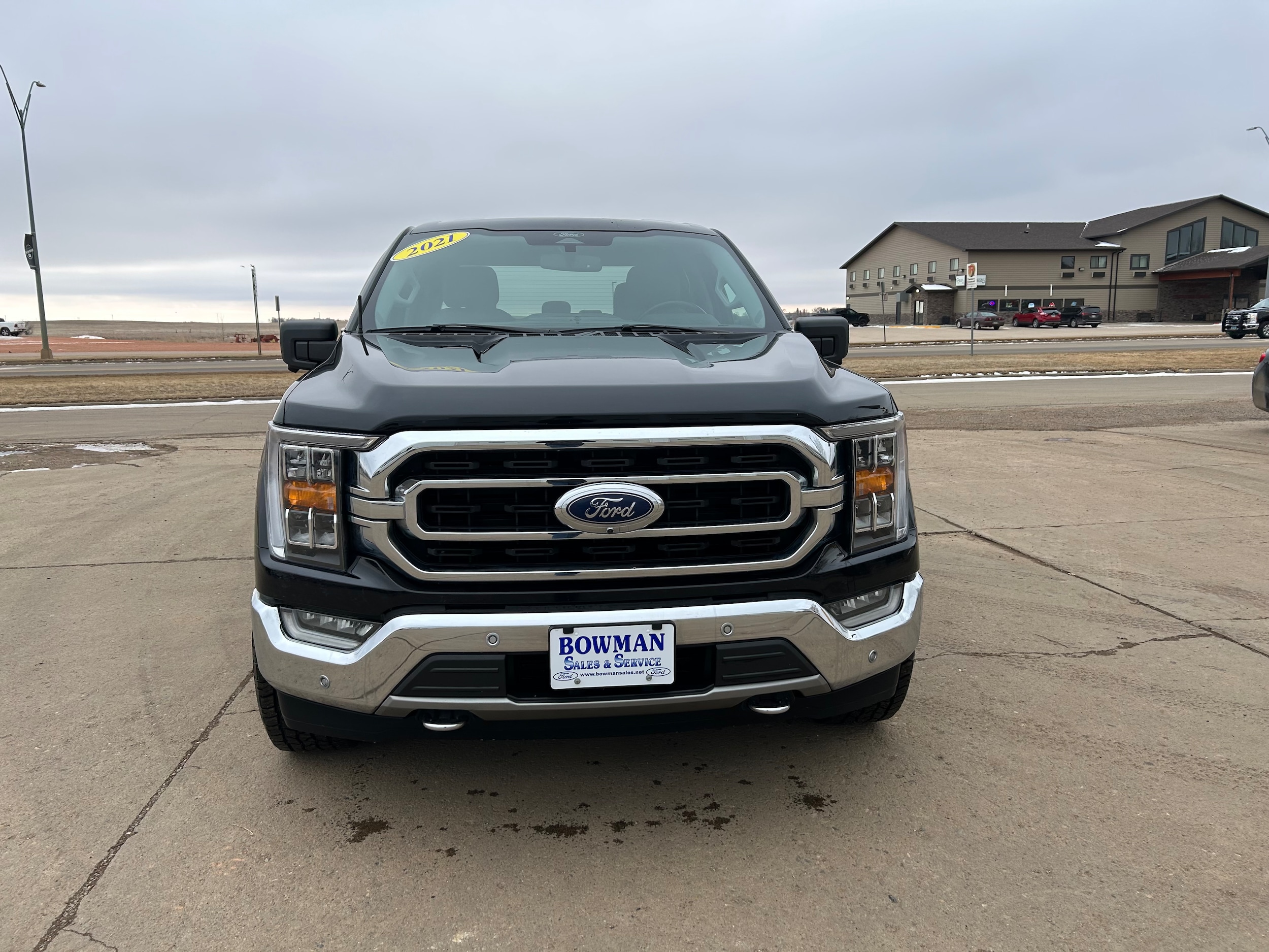 Used 2021 Ford F-150 XLT with VIN 1FTFW1E86MFA27557 for sale in Bowman, ND