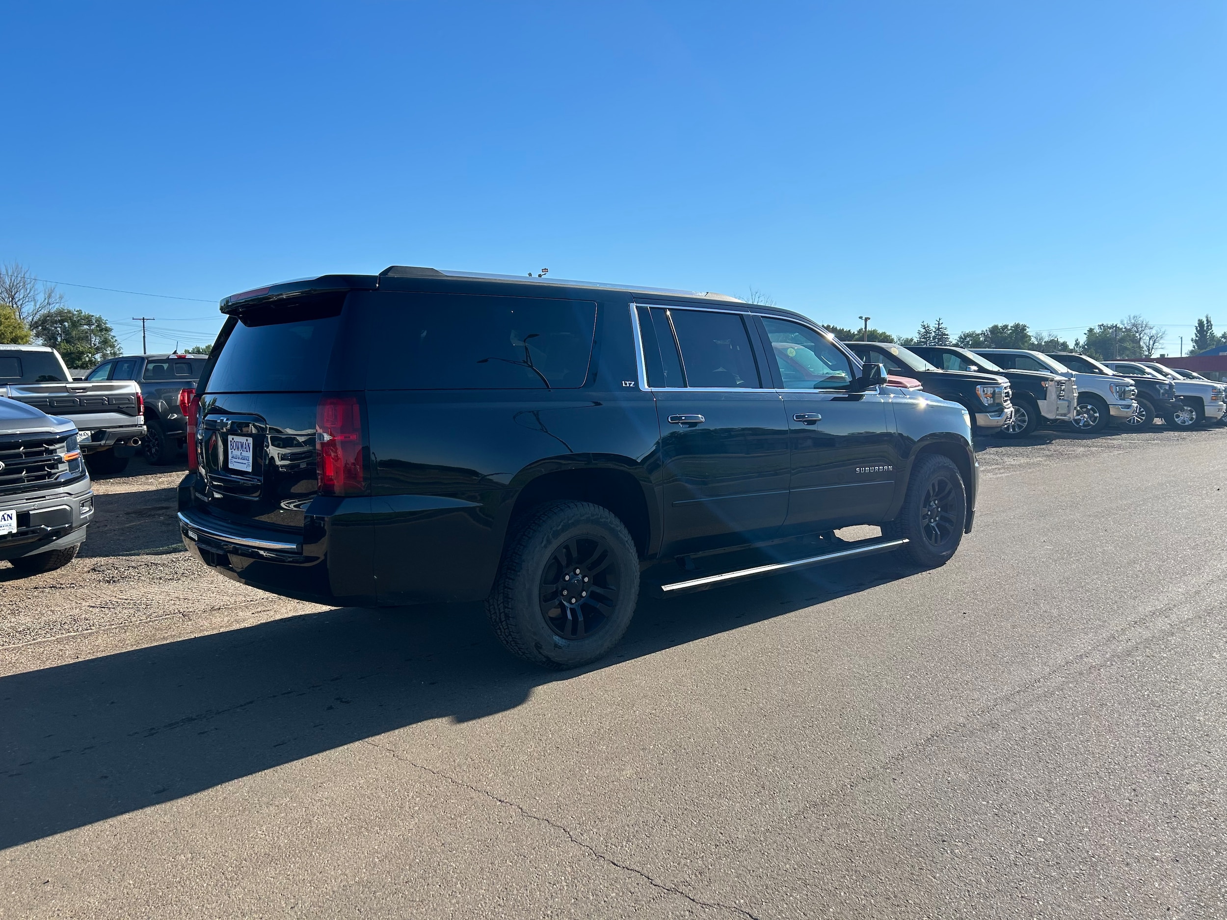 Used 2015 Chevrolet Suburban LTZ with VIN 1GNSKKKC7FR117673 for sale in Bowman, ND