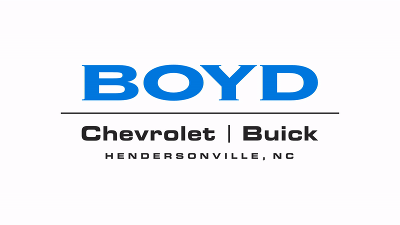  Person cheerfully signing documents.