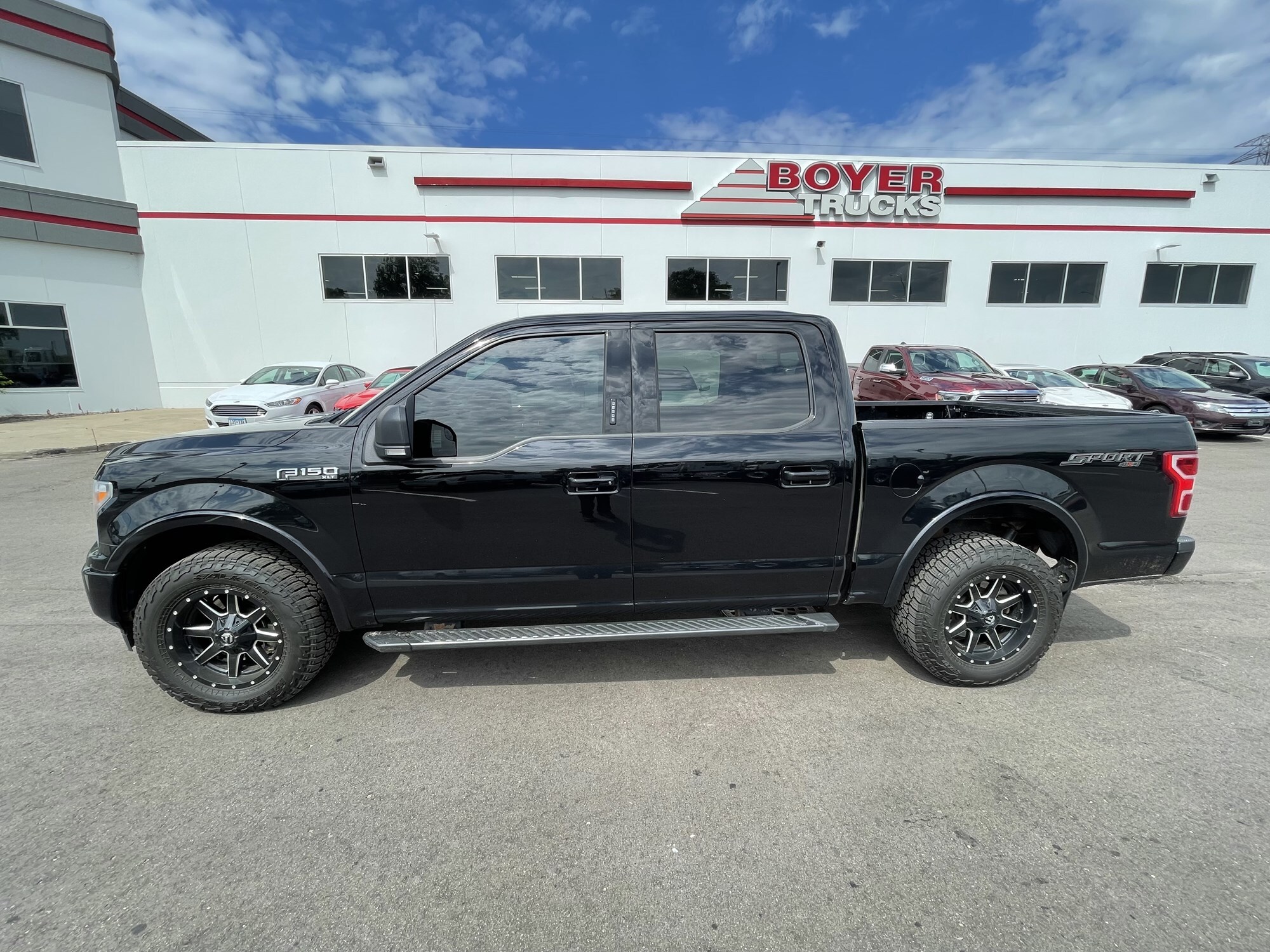 Used 2018 Ford F-150 XLT with VIN 1FTEW1EP7JFA32085 for sale in Minneapolis, Minnesota