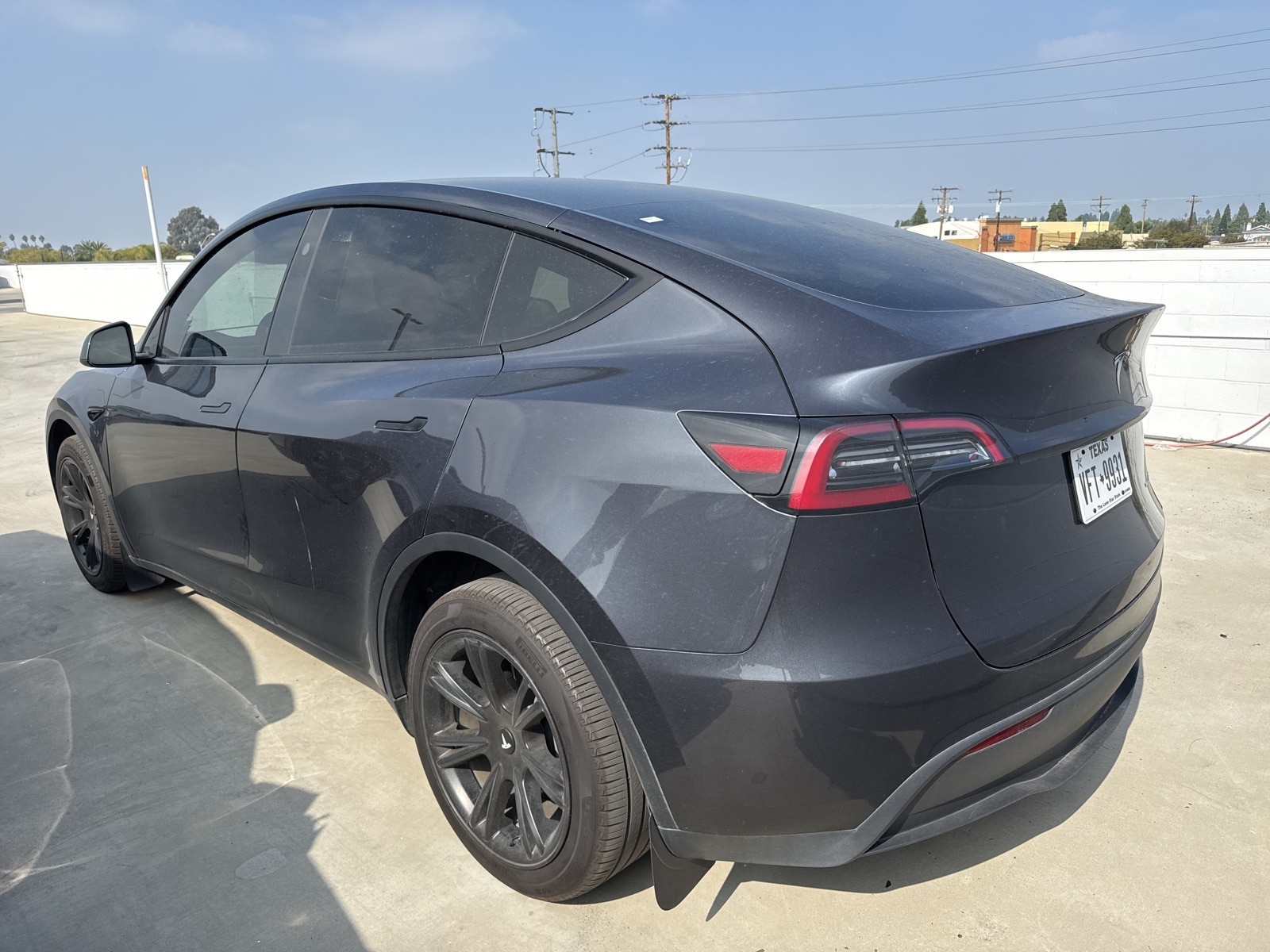 Used 2024 Tesla Model Y Long Range with VIN 7SAYGDEEXRA274282 for sale in Long Beach, CA