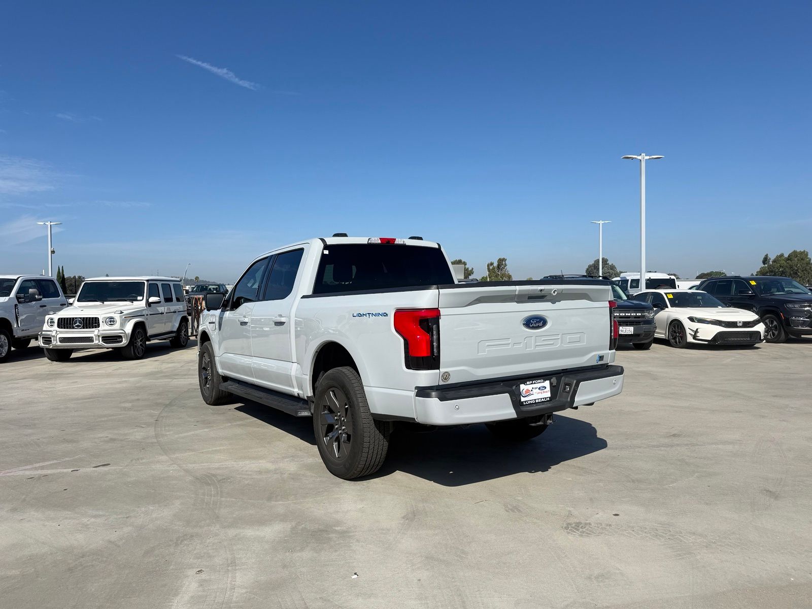 Used 2023 Ford F-150 Lightning XLT with VIN 1FT6W1EV5PWG26492 for sale in Long Beach, CA