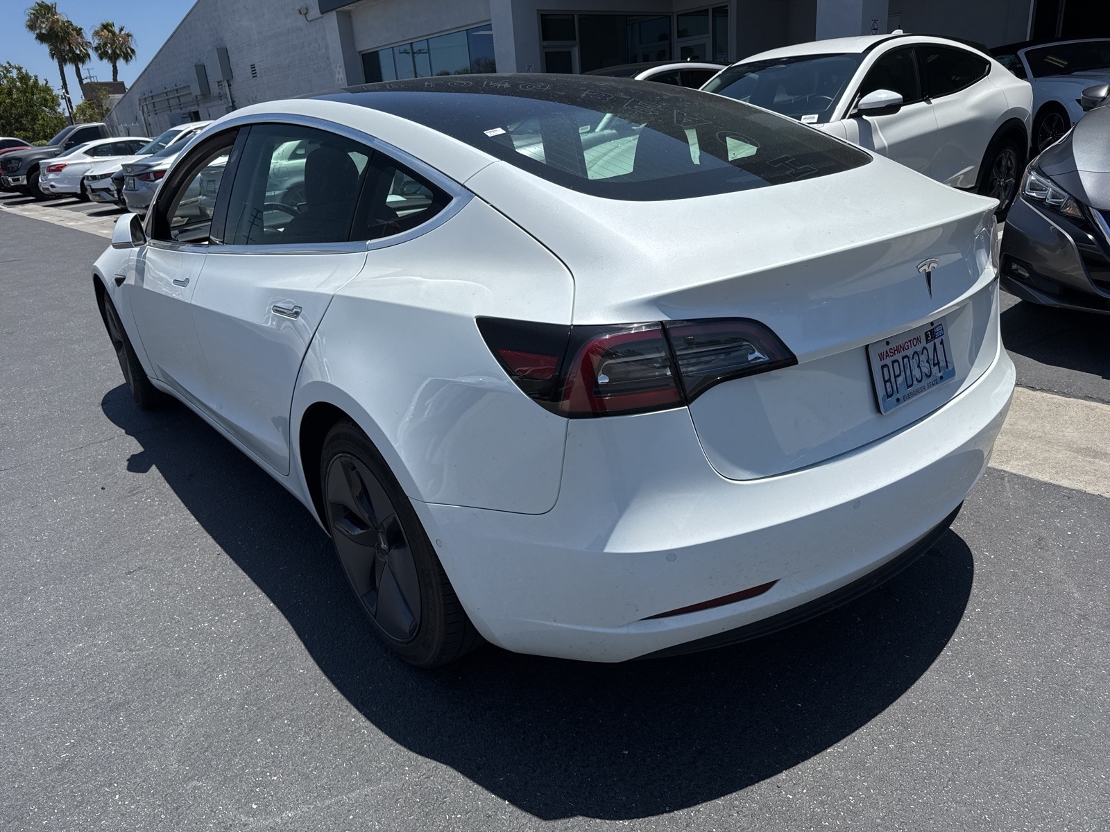 Used 2019 Tesla Model 3 Base with VIN 5YJ3E1EA1KF299766 for sale in Long Beach, CA