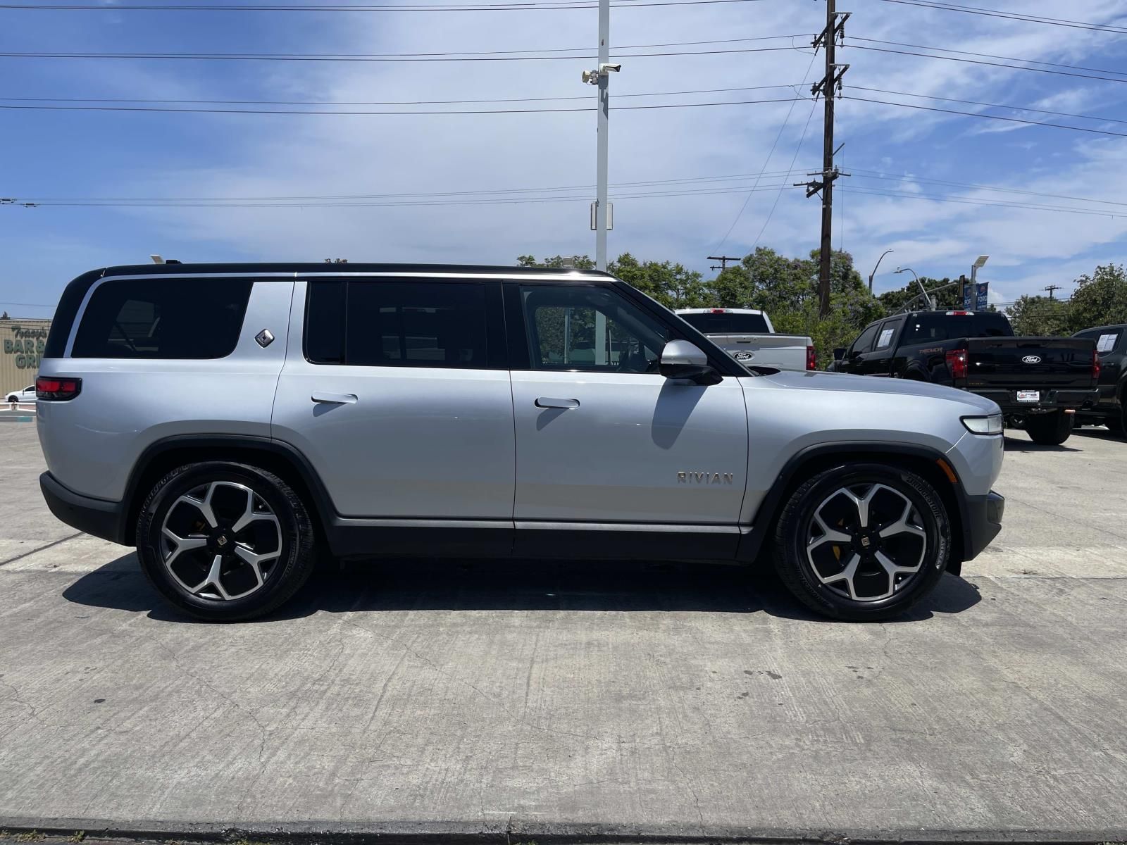 Used 2024 Rivian R1S Adventure with VIN 7PDSGABA9RN041588 for sale in Long Beach, CA