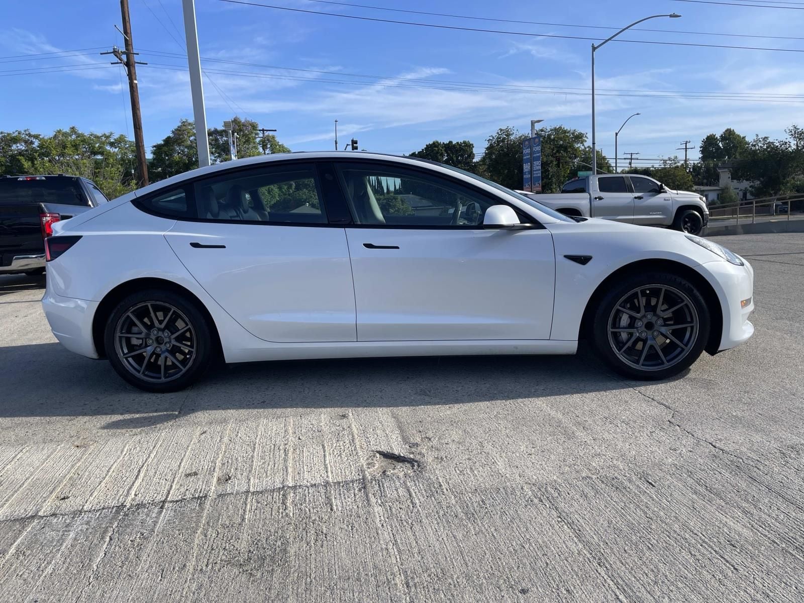 Used 2023 Tesla Model 3 Base with VIN 5YJ3E1EA7PF544769 for sale in Long Beach, CA