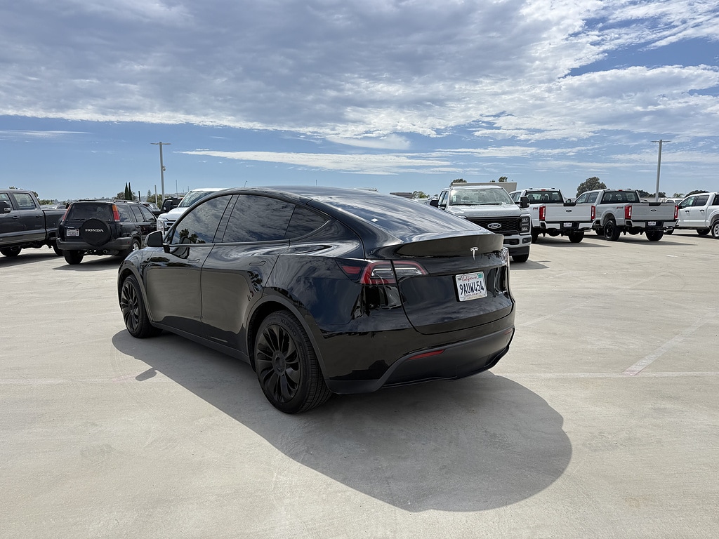 Used 2022 Tesla Model Y Long Range with VIN 7SAYGAEE6NF402044 for sale in Long Beach, CA